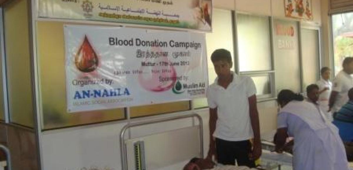 Locals donating blood at Muslim Aid Sri Lanka supported blood donation camp in Muttur, Sri Lanka